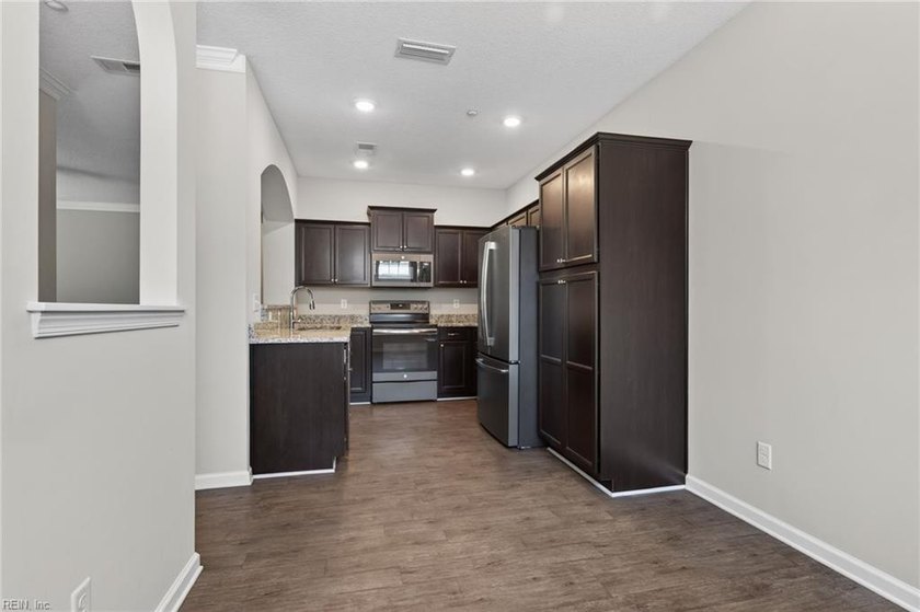Enjoy easy one-level living in the sought-after Promenade at - photo 11