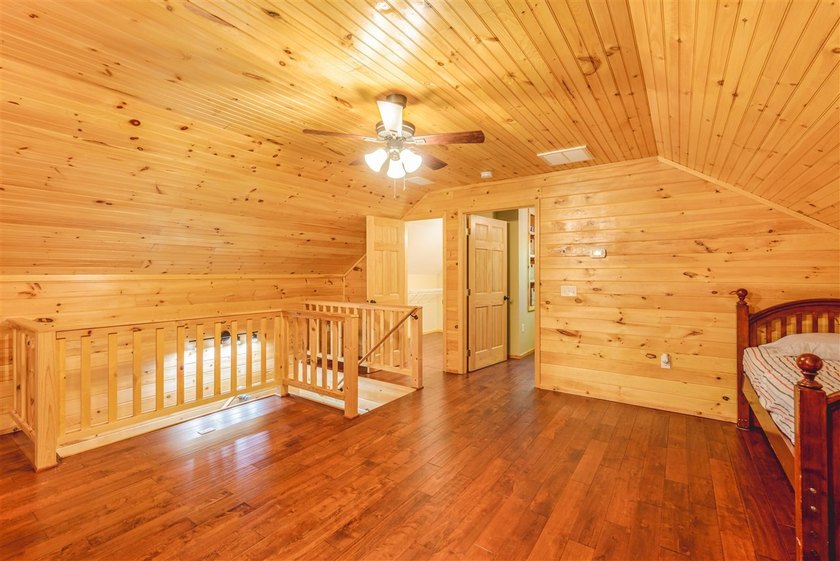 Lake living at its finest! This charming log-sided home offers - photo 14