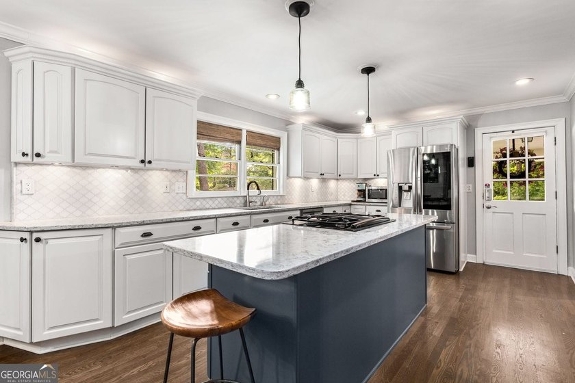 Nestled on a large 3/4+ acre serene, corner lot in the highly - photo 20