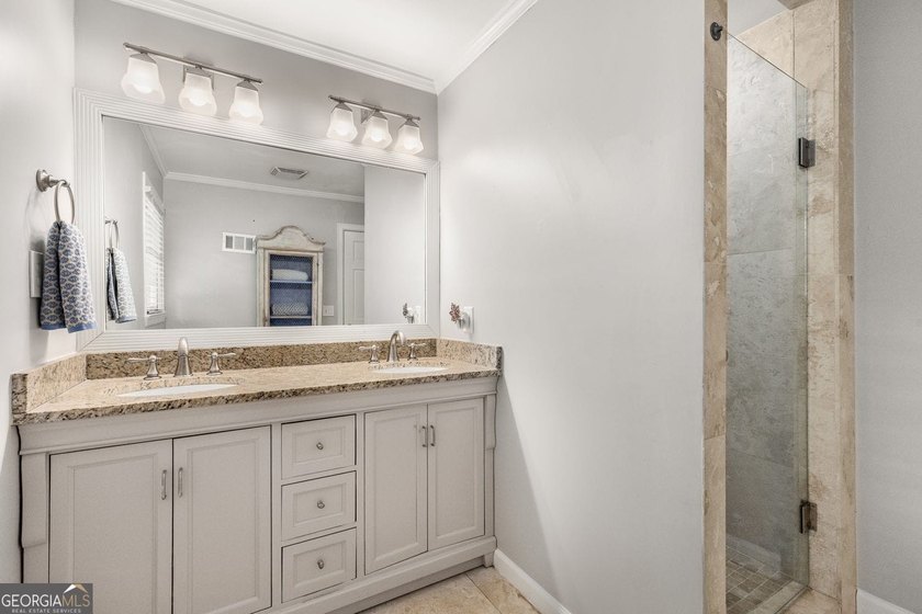 Nestled on a large 3/4+ acre serene, corner lot in the highly - photo 28