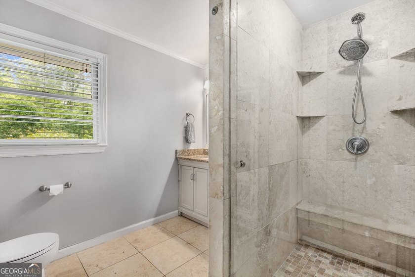 Nestled on a large 3/4+ acre serene, corner lot in the highly - photo 29