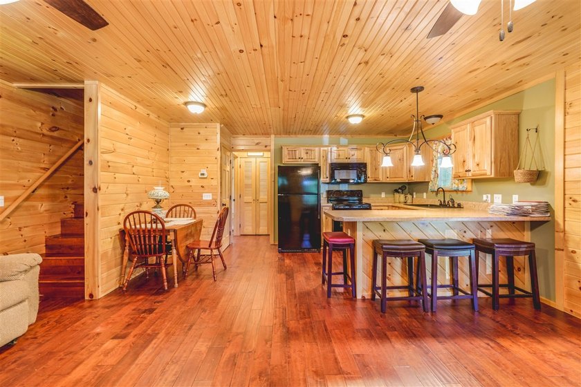 Lake living at its finest! This charming log-sided home offers - photo 30