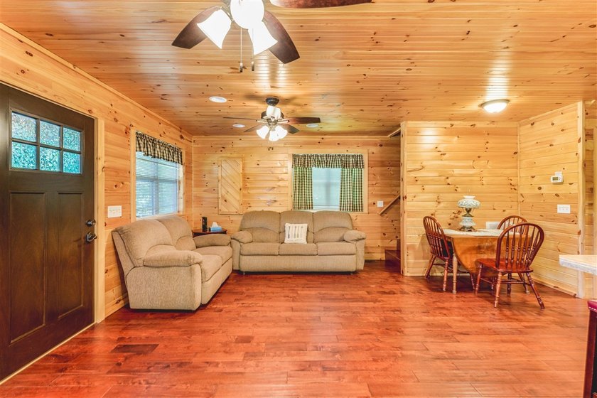 Lake living at its finest! This charming log-sided home offers - photo 31