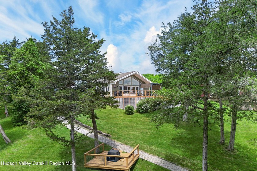 Nestled on .55 acres along Sleepy Hollow Lake, this 3-bedroom - photo 31