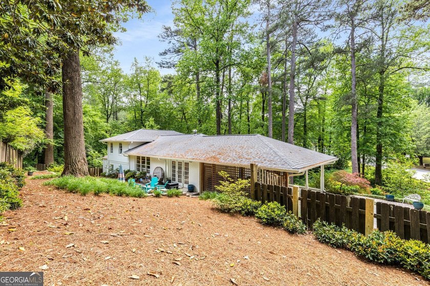 Nestled on a large 3/4+ acre serene, corner lot in the highly - photo 43