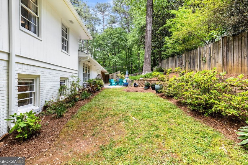 Nestled on a large 3/4+ acre serene, corner lot in the highly - photo 47