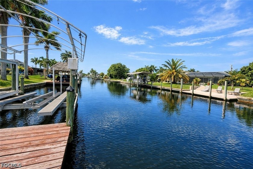 DIRECT GULF ACCESS OVERSIZED LOT with 10,000 lb dock and lift - photo 3