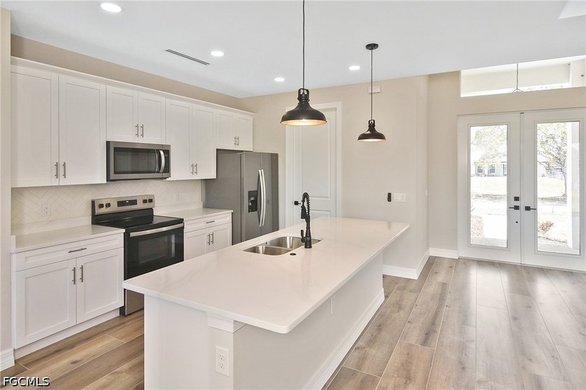 Come view this gorgeous brand-new home nestled feet away from - photo 6