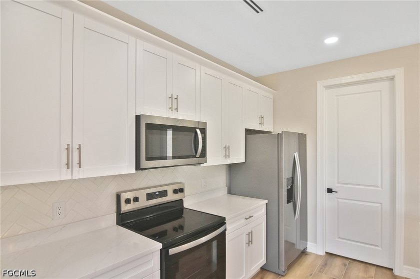 Come view this gorgeous brand-new home nestled feet away from - photo 8
