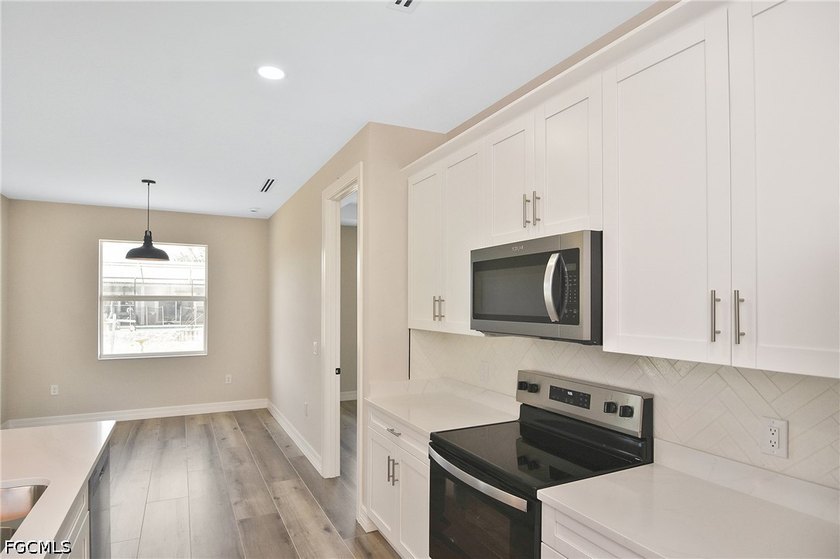 Come view this gorgeous brand-new home nestled feet away from - photo 10