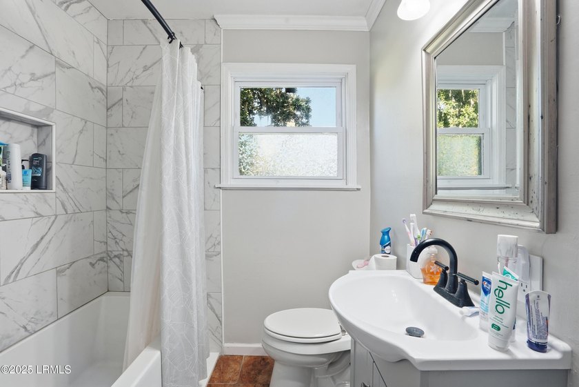 Welcome to this cozy 3-bedroom, 1-bath home offering both - photo 11