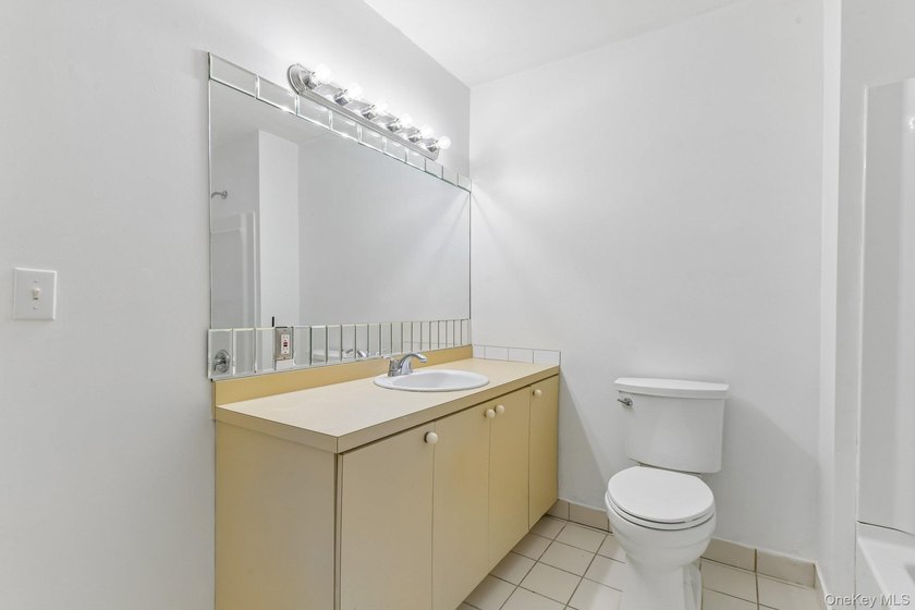 Tucked away on just over an acre in a private, wooded setting - photo 24