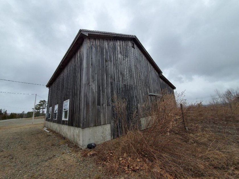 Unique riverfront property offers versatility, tranquil location - photo 47
