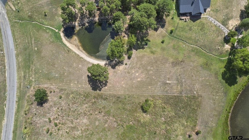 Beautiful waterfront lot on lake Bob Sandlin. Fabulous site for - photo 13