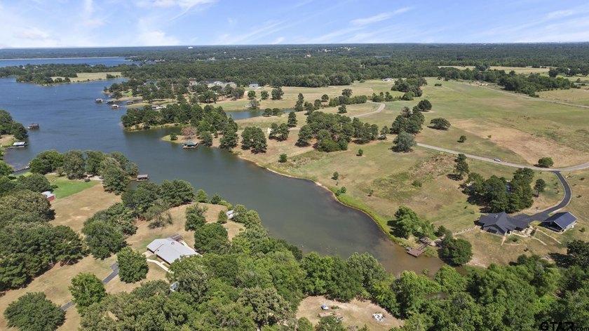 Beautiful waterfront lot on lake Bob Sandlin. Fabulous site for - photo 14