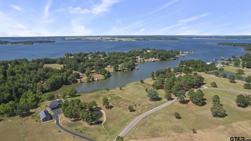 Beautiful waterfront lot on lake Bob Sandlin. Fabulous site for - photo 16