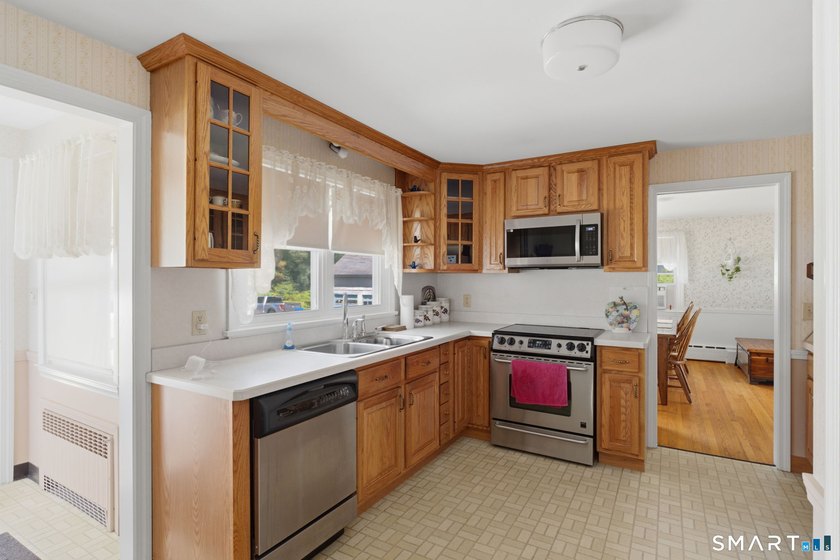 Situated directly across from Sears Park on Lake Pocotopaug - photo 12