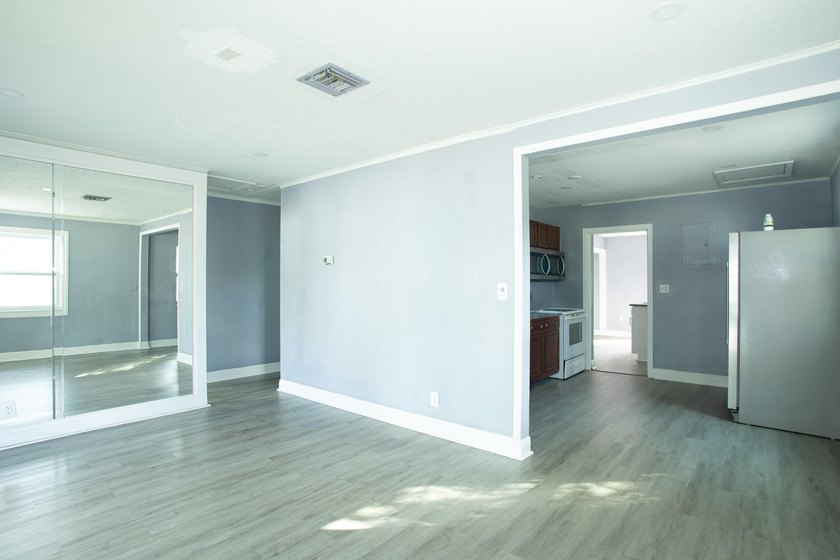 Home is move-in ready! This spacious 4-bedroom, 2-bath - photo 3