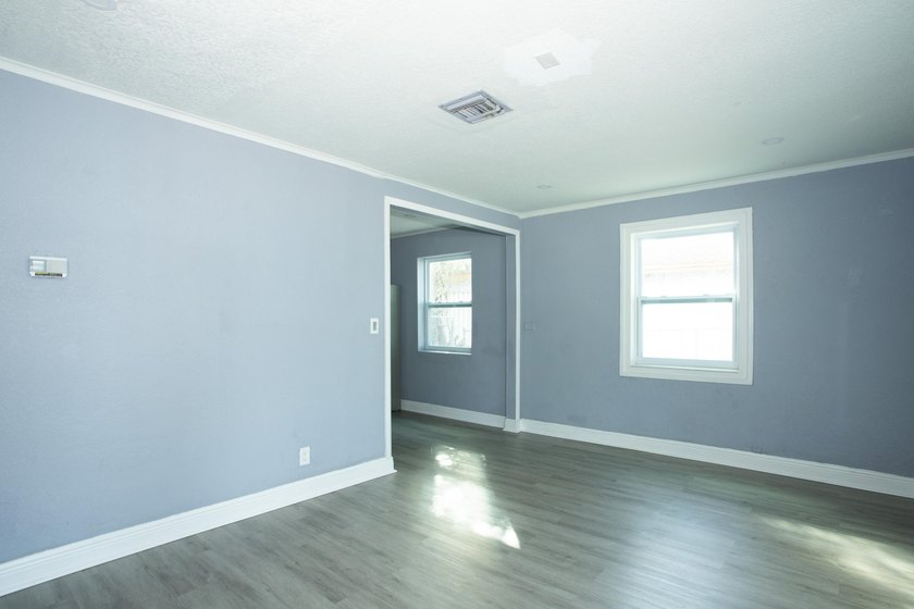 Home is move-in ready! This spacious 4-bedroom, 2-bath - photo 4