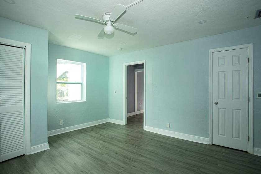 Home is move-in ready! This spacious 4-bedroom, 2-bath - photo 8