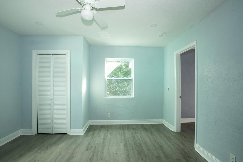 Home is move-in ready! This spacious 4-bedroom, 2-bath - photo 9