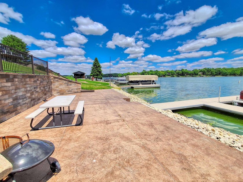 Lake life just got an upgrade. This remodeled waterfront home at - photo 31