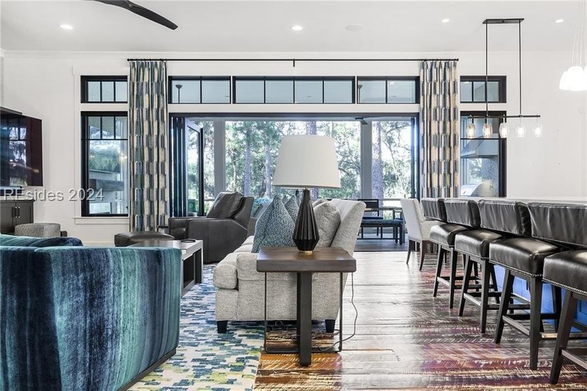 Delight in the welcoming luxury of this four-bedroom - photo 5