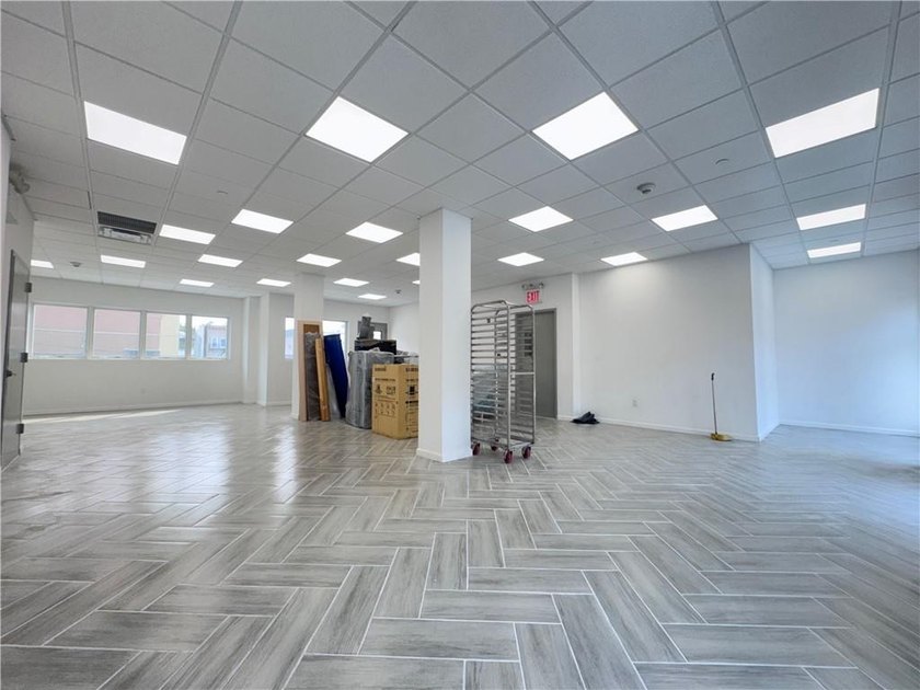 Welcome to 1374 65th Street, a brand-new commercial building in - photo 12