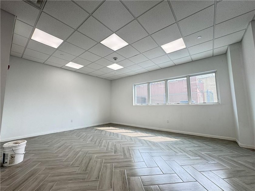 Welcome to 1374 65th Street, a brand-new commercial building in - photo 13
