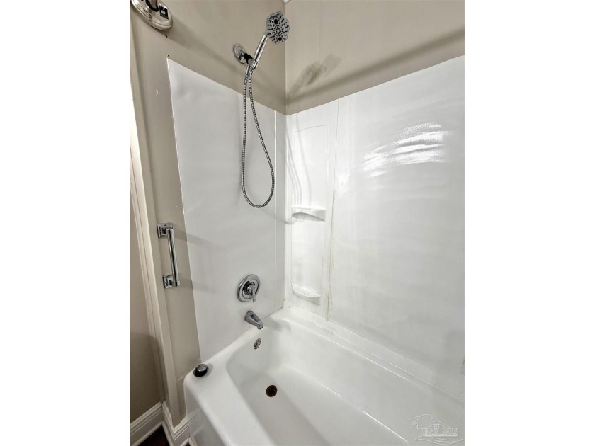 Fully renovated and move-in ready! This charming 3-bedroom - photo 13