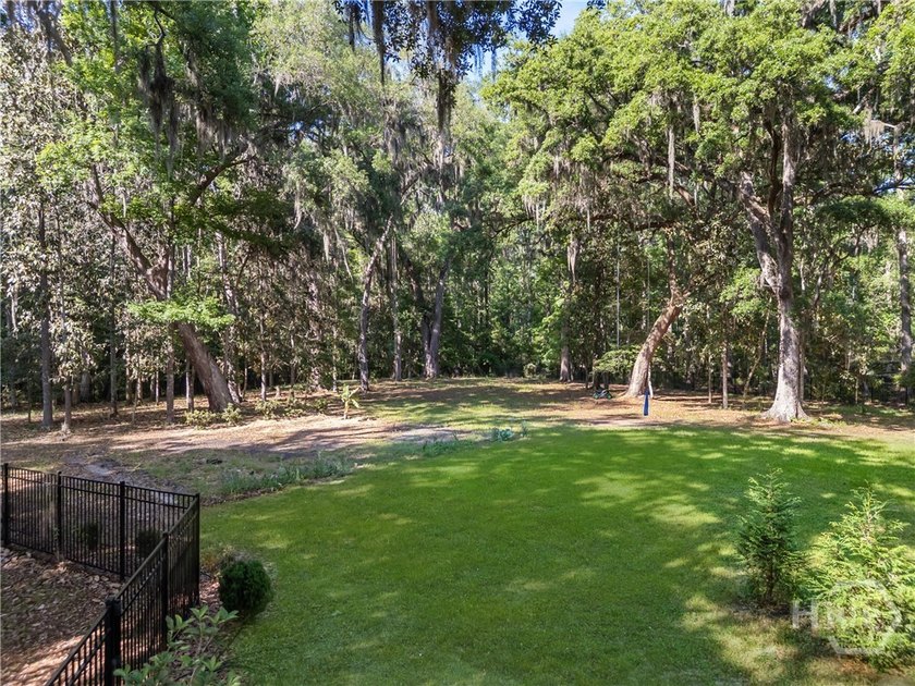Welcome to this exceptional 5-bedroom, 3-bath home in the highly - photo 49