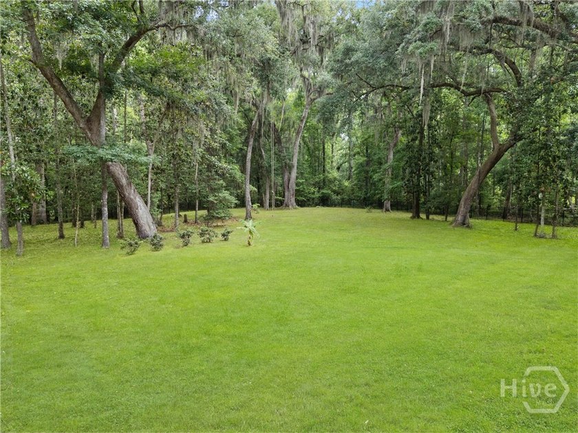 Welcome to this exceptional 5-bedroom, 3-bath home in the highly - photo 50