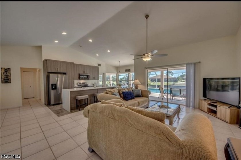 Welcome to this spacious waterfront pool home located in a - photo 4