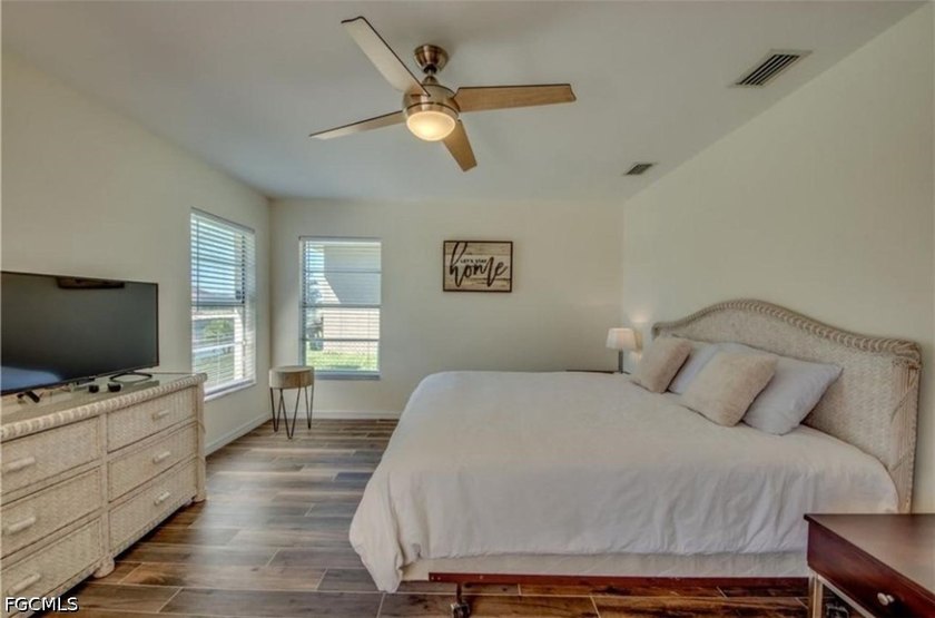 Welcome to this spacious waterfront pool home located in a - photo 8