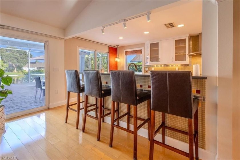 Discover this exceptional lakefront pool home in the highly - photo 15