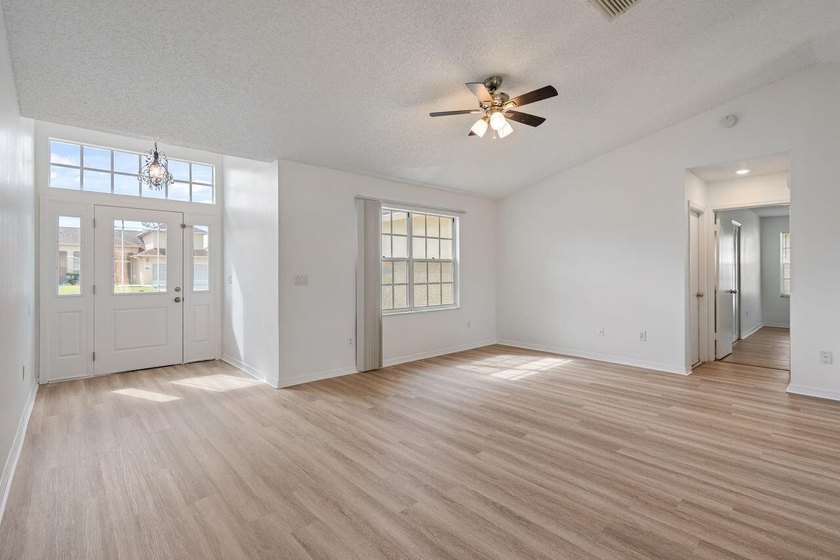 FRESHLY REMODELED Palm Bay home featuring a brand-new roof - photo 4