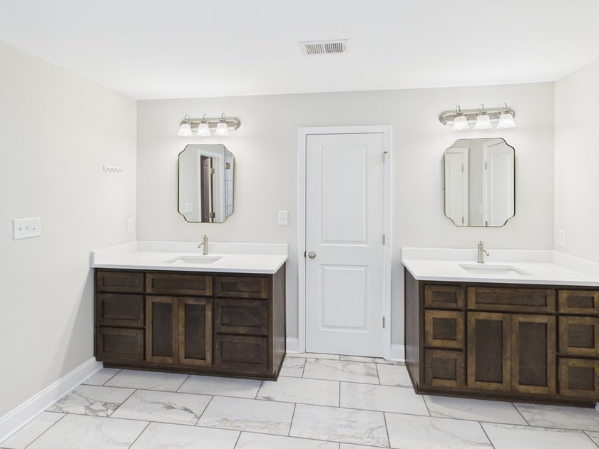 Set on over two private, wooded acres, this beautifully updated - photo 29