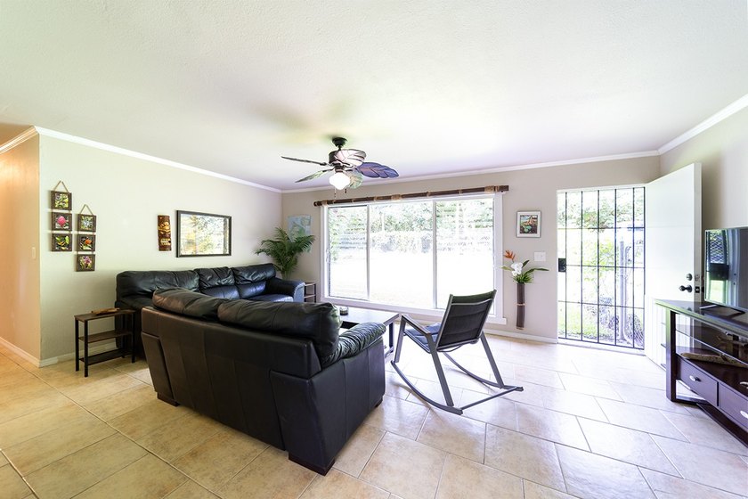 Welcome to this fully furnished 3-bedroom, 2-bath home tucked - photo 3