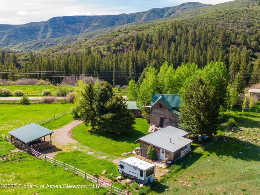 Set in the heart of the Roaring Fork Valley, this extraordinary - photo 36
