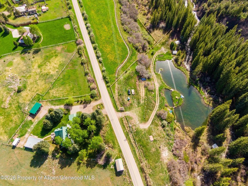 Set in the heart of the Roaring Fork Valley, this extraordinary - photo 45