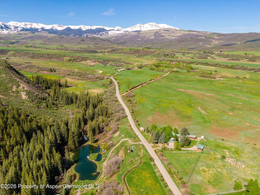 Set in the heart of the Roaring Fork Valley, this extraordinary - photo 48