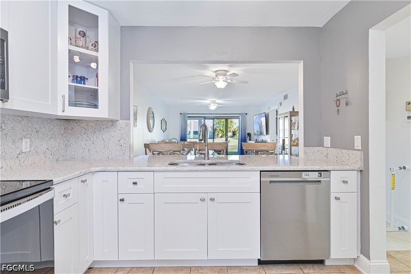 Welcome to this beautifully updated, FIRST FLOOR condominium in - photo 3