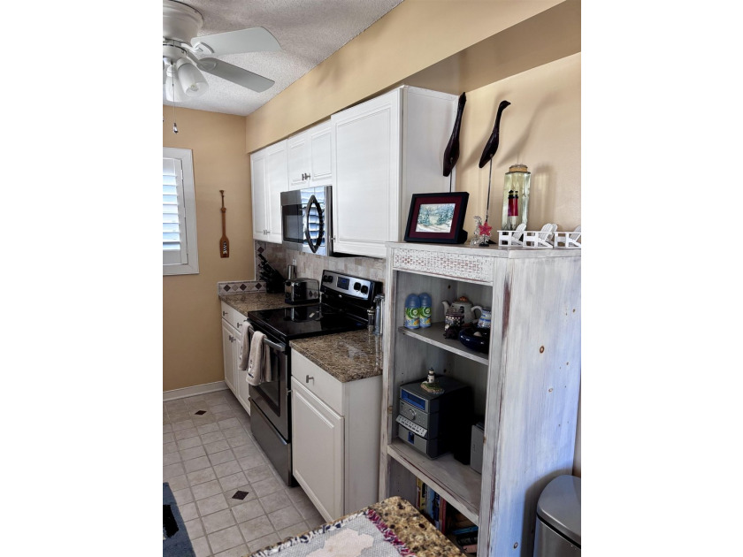 Rare offering of this fully furnished and very well maintained - photo 13