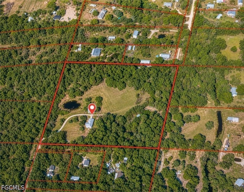 Nestled at the end of a private road, this peaceful 10.41-acre - photo 3