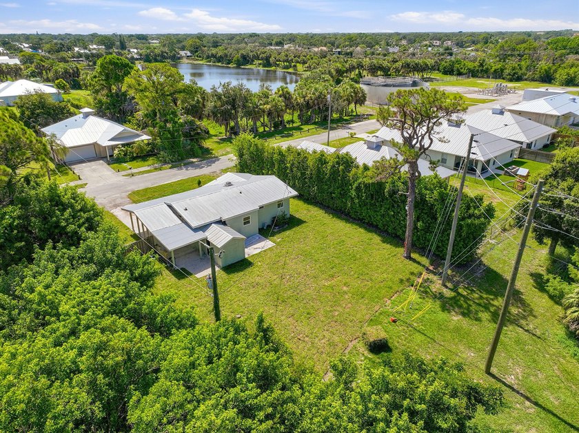 This charming single family home is tucked away in the back - photo 33