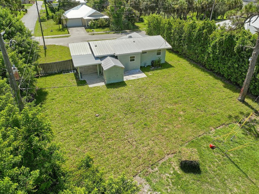 This charming single family home is tucked away in the back - photo 34