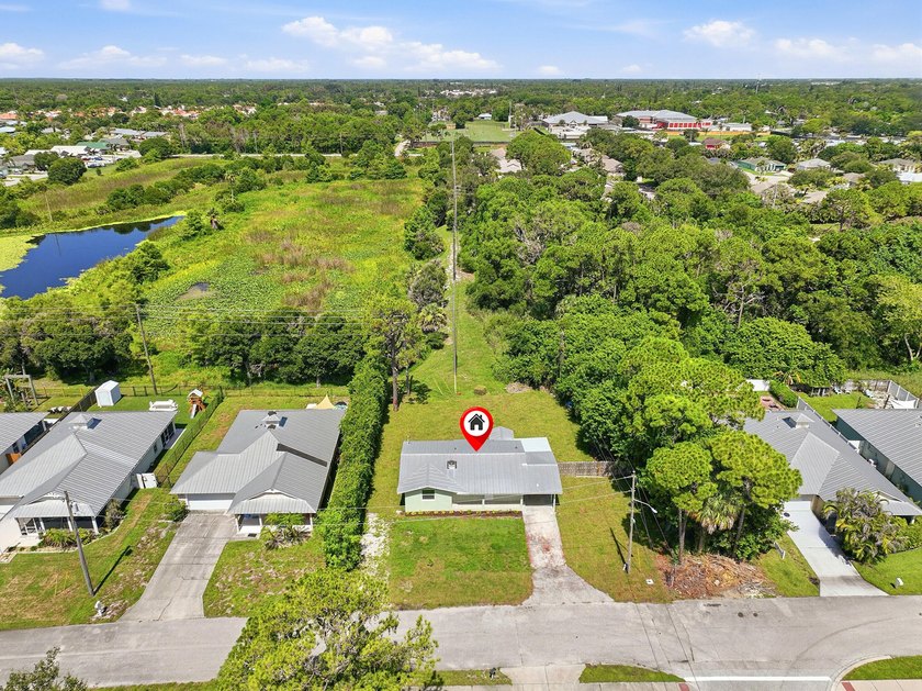 This charming single family home is tucked away in the back - photo 37