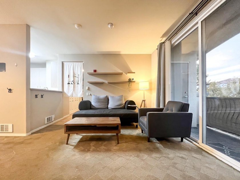 Discover this charming top-floor condo nestled in the - photo 2