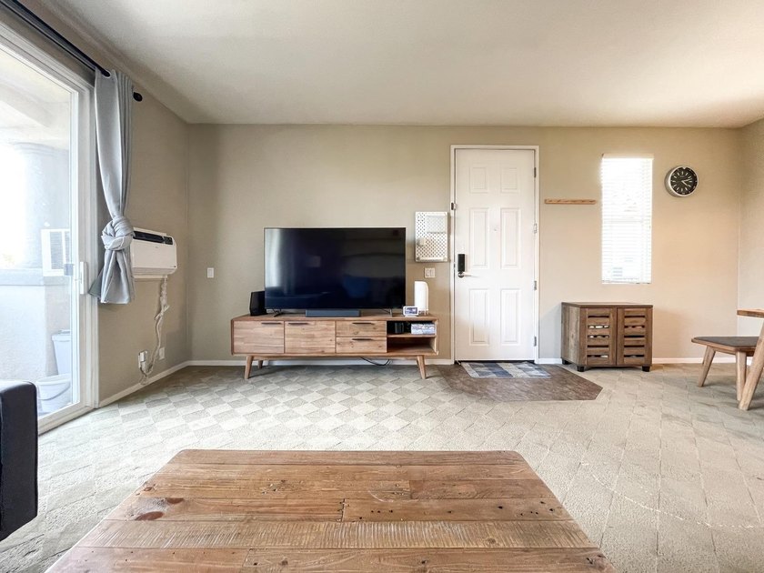 Discover this charming top-floor condo nestled in the - photo 3