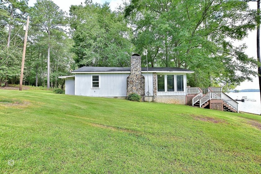 Wake up to breathtaking long-range views of Lake Harding from - photo 14